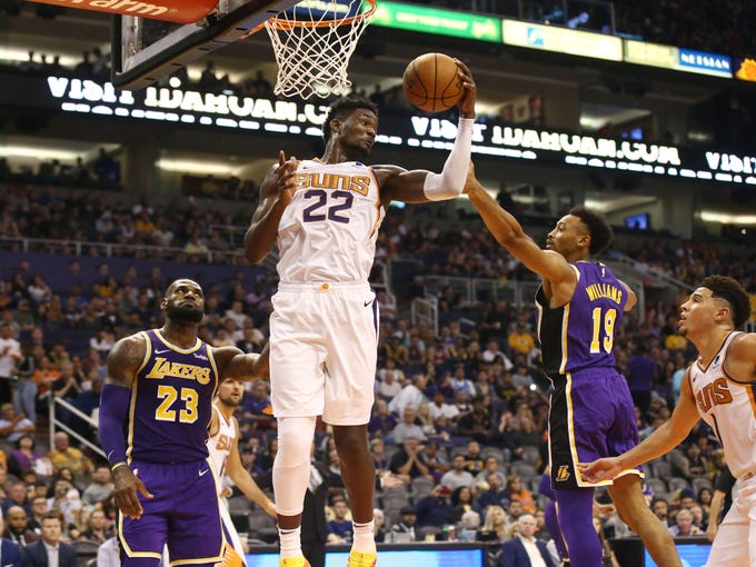 The Suns' Deandre Ayton rebounds a missed shot by the Lakers? LeBron James in the second half of Wednesday night?s game at Talking Stick Resort Arena. Visit suns.azcentral.com for a recap of the Suns? 131-113 loss to the Lakers.
Rob Schumacher/The Republic
Phoenix Suns' Deandre Ayton rebounds a missed shot by Los Angeles Lakers LeBron James in the second half during a game on Oct. 24 at Talking Stick Resort Arena.