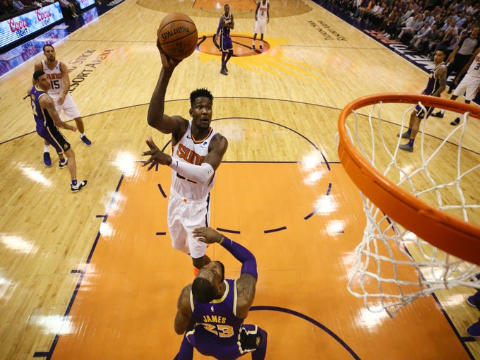 Phoenix Suns' Deandre Ayton shoots over Los Angeles Lakers' LeBron James during a game on Oct. 24 at Talking Stick Resort Arena.