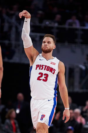 Blake Griffin reacts after making a three-pointer in overtime against the 76ers.