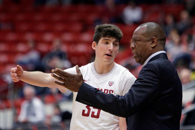 Washington State head coach Ernie Kent, right, speaks with guard Carter Skaggs during a game last season in Pullman. For the fourth consecutive year, Washington State is picked to finish last in the Pac-12. Kent is entering his fifth season and has yet to post a winning record at WSU.