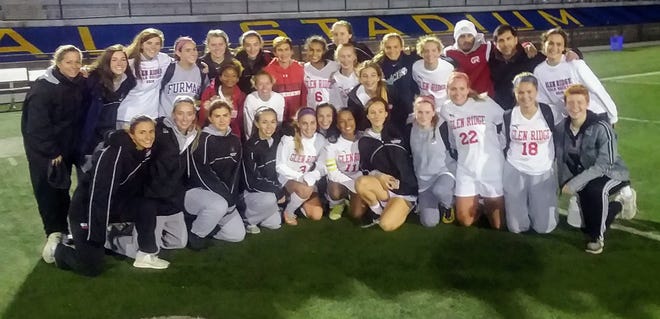 Glen Ridge girls soccer team is all smiles after defeating Nutley in the semifinal of the Essex County tournament Oct. 24 at Belleville High.