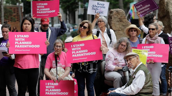 Supporters of Planned Parenthood demonstrated in...