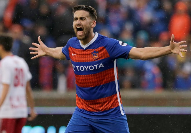FC Cincinnati midfielder Nazmi Albadawi (5) shouts at an official in the first half of the USL Eastern Conference Semifinal match between the FC Cincinnati and the New York Red Bulls II at Nippert Stadium in Cincinnati on Tuesday, Oct. 16, 2018. New York Red Bulls II led 1-0 at half time.