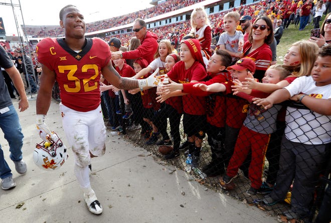 Iowa State running back David Montgomery (32) celebrates with fans after an NCAA college football game against Texas Tech, Saturday, Oct. 27, 2018, in Ames, Iowa. (AP Photo/Charlie Neibergall)