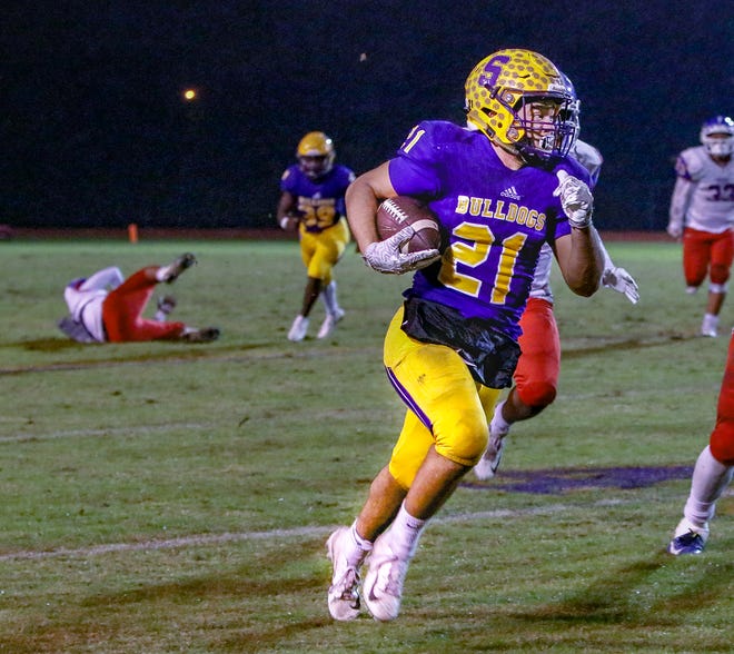 Blake Watkins turned a high snap into a big gain and sets Smyrna up for a field goal just before halftime of Friday's game against McGavock.