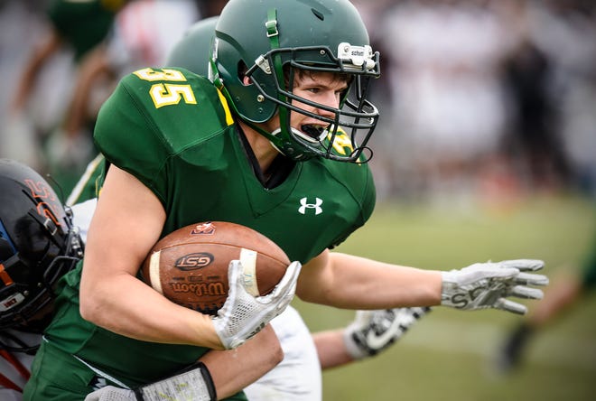 Zach Storms carries the ball for Sauk Rapids in the second half of the Saturday, Oct. 27,Section 6-5A semifinal game against Tech in Sauk Rapids. Storms caught a pass from quarterback Cade Milton-Baumgardner with 5.9 seconds left in the fourth quarter to give the Storm a 20-16 win. 