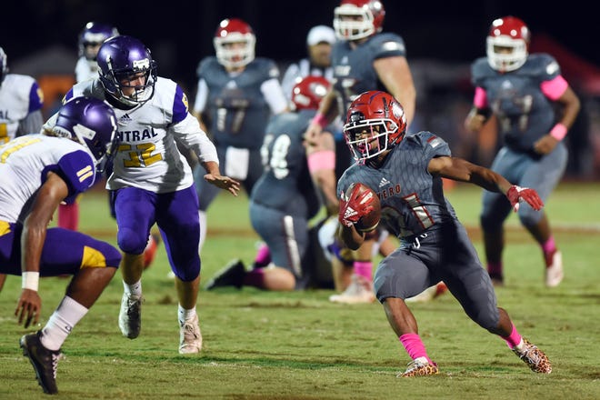 Vero Beach High School's Bryan Primus-Winston moves the ball up the field Friday, Oct. 26, 2018 during a game against Fort Pierce Central at the Citrus Bowl in Vero Beach. The Fighting Indians won the game 51-13.
