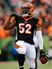 Cincinnati Bengals linebacker Preston Brown (52) celebrates after intercepting a pass intended for Tampa Bay Buccaneers wide receiver Mike Evans (13) in the first quarter of the NFL Week 8 game between the Cincinnati Bengals and the Tampa Bay Buccaneers at Paul Brown Stadium in downtown Cincinnati on Tuesday, Oct. 16, 2018.