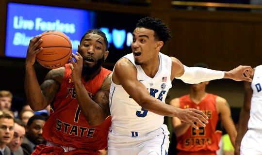 Duke's Tre Jones guard (3) challenges Ferris State's DeShaun Thrower (1) in the first half of an NCAA college basketball exhibition game, Saturday, Oct. 27, 2018, in Durham, N.C.