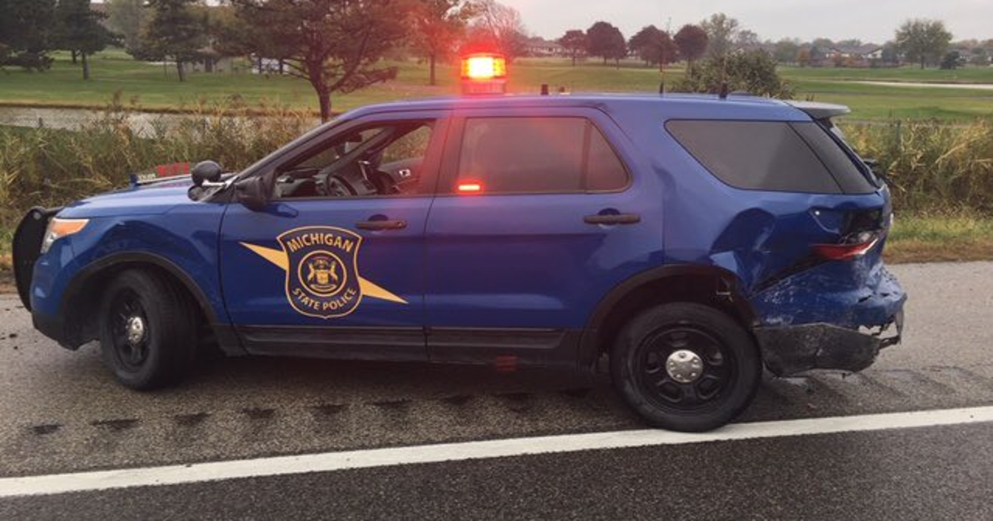 Michigan State Police trooper struck sitting in patrol SUV