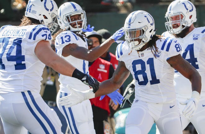 Indianapolis Colts tight end Mo Alie-Cox (81) celebrates his first NFL career touchdown, a 26-yard, one-handed grab.