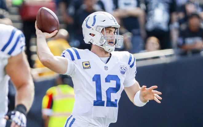 Indianapolis Colts quarterback Andrew Luck (12) drops back to pass during the first half against the Oakland Raiders.