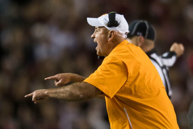 Tennessee Head Coach Jeremy Pruitt yells to players on the field during a game between Tennessee and South Carolina at Williams-Brice Stadium Saturday, Oct. 27, 2018.