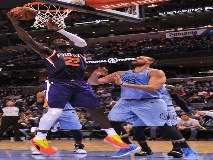 Oct 27, 2018; Memphis, TN, USA; Phoenix Suns center Deandre Ayton (22) shoots the ball over Memphis Grizzlies center Marc Gasol (33) during the first half at FedExForum. Mandatory Credit: Justin Ford-USA TODAY Sports