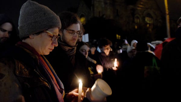 Mourners gather for vigil in the Squirrel Hill...