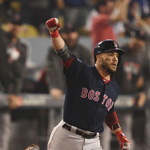 Red Sox first baseman Steve Pearce hits a...