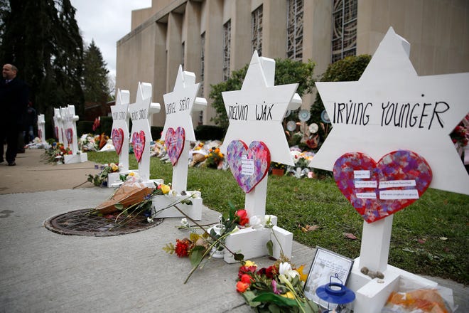 Names of the victims in the mass shooting at Tree of Life Congregation Synagogue at a memorial outside of the synagogue in the Squirrel Hill neighborhood of Pittsburgh Monday, October 27, 2018.On Saturday Robert Bowers allegedly screamed anti-Semitic epithets, as he opened fire during a service at Tree of Life Congregation Synagogue law enforcement officials said. Eleven worshippers were killed and six other people were wounded Saturday.