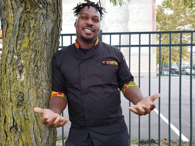 Godwin Ihentuge is opening a brick-and-mortar version of his popular West African-Caribbean food truck YumVillage in Detroit's burgeoning New Center neighborhood.