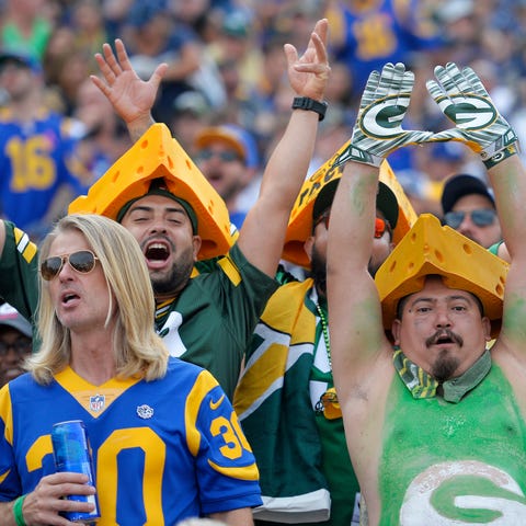 Rams fans were surrounded by Packers fans wearing...