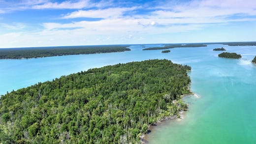 A private island and lodge on Grand Lake in Presque Isle is up for auction. Bids start at $250,000.
