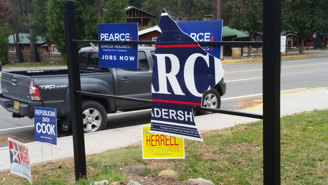 Political signs vandalized outside of state Rep. Zach Cook's attorney's office on Sudderth Drive in Ruidoso.