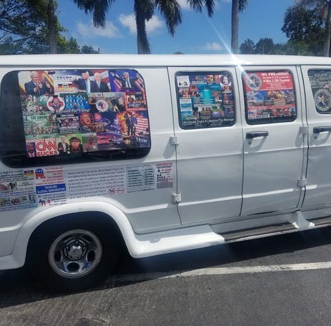 Cesar Sayoc's van, covered in political stickers...