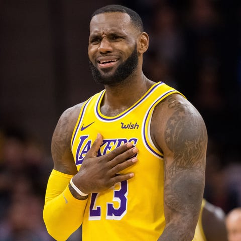 Lakers forward LeBron James reacts to a call in...