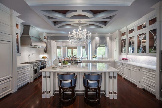The biggest change, and the one that is award winning, is the kitchen. It won a first-place national award for best kitchen design in Florida from Wood-Mode Fine Custom Cabinetry.