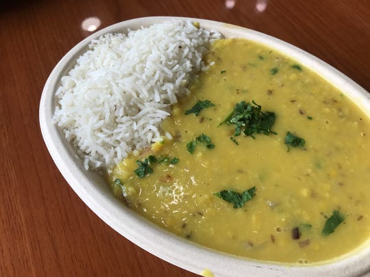 Vegan yellow dal with rice at Fresh Indian Grill, a quick-service restaurant at 1420 W. Main St., Suite D, in Carmel.