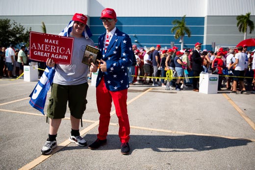 Chris Swanson, left, and Dave Mikolajczak, right, pose for a portrait before a Trump rally on Wednesday, October 31, 2018, at Hertz Arena in Estero.