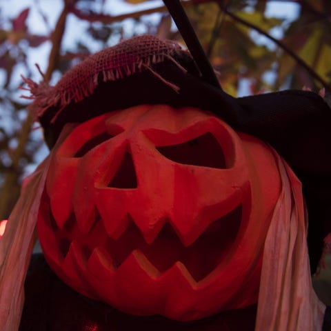 Halloween decorations are seen in a garden at...