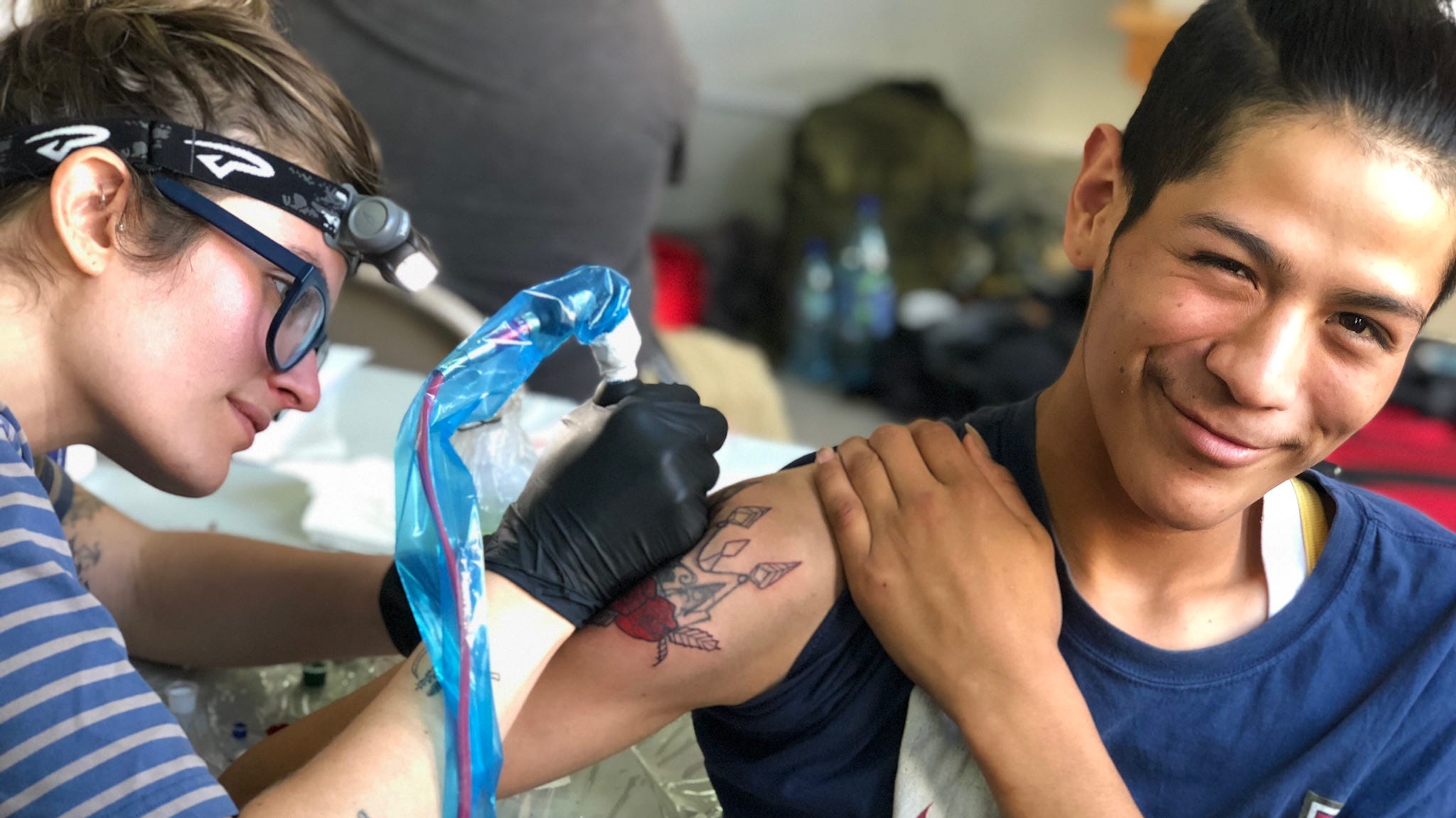 Cincinnati tattoo shop does cover up tattoos for former Guatemalan gang  members