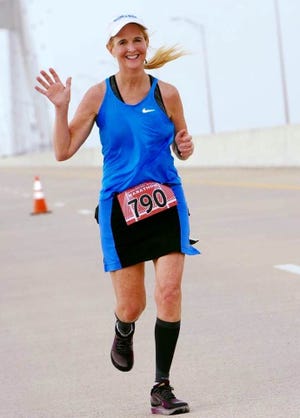 UWF professor Barbara White will compete in her 100th marathon this weekend at the Pensacola Marathon.