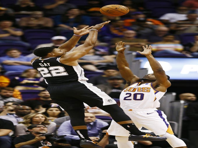 San Antonio Spurs forward Rudy Gay shoots a jumper over Phoenix Suns' Josh Jackson in the first half on Oct. 31 at Talking Stick Resort Arena.
