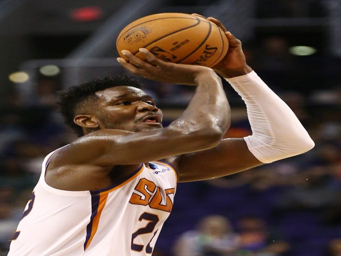 Phoenix Suns center Deandre Ayton shoots a jumper against the San Antonio Spurs in the first half on Oct. 31 at Talking Stick Resort Arena.