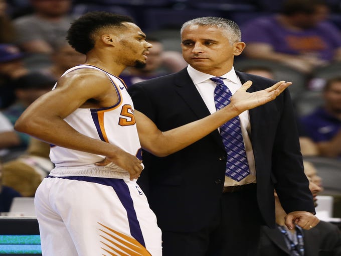 Phoenix Suns head coach Igor Kokoskov talks guard 	Elie Okobo against the San Antonio Spurs in the second half on Oct. 31 at Talking Stick Resort Arena.