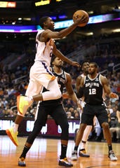 Suns forward Josh Jackson drives to the basket during the first half of a game against the Spurs on Oct. 31 at Talking Stick Resort Arena.