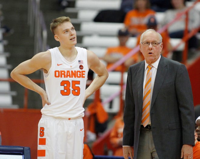 Buddy Boeheim, left, and his dad, SU coach Jim Boeheim. The freshman guard got off to a fast start with his 3-point shooting in two exhibition games.