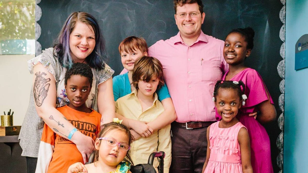 Shannon Dingle with her husband and six children in Raleigh, North Carolina, in April 2018.