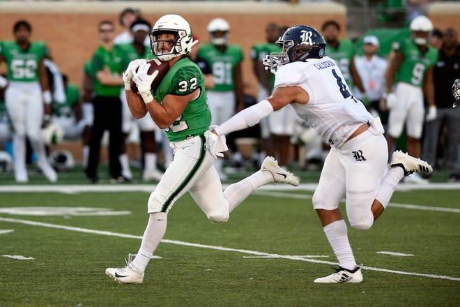 North Texas wide receiver Michael Lawrence (32) catches the ball against Rice on Saturday, Oct. 27, 2018, in Denton.