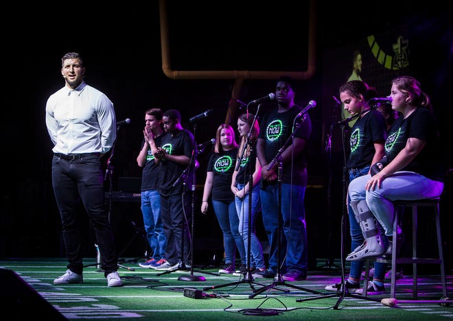Thousands attended the tenth annual Fields of Faith event at Worthen Arena where former NFL player and current minor league baseball player Tim Tebow spoke about his faith to FCA members. 