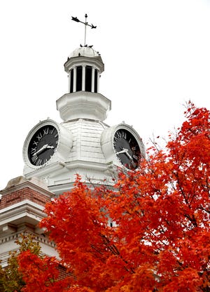 Birds rest on the top of the cupola and weather vane of the Rutherford County Courthouse in Murfreesboro as trees begin to change color and fall from their branches on the first day of November around the Murfreesboro Public Square on Thursday, Nov. 1, 2018. 