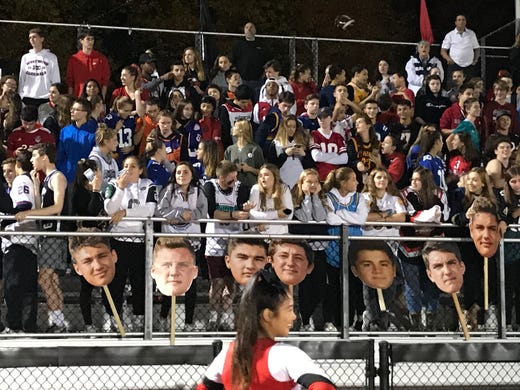 The student section at Westwood cheers on the Cardinals.