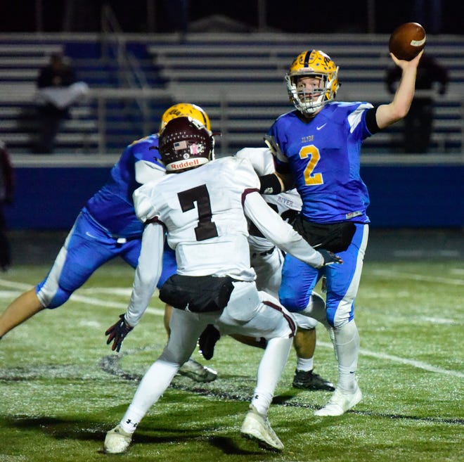 Clyde's Ryan Lozier throws a pass Friday against Rocky River.