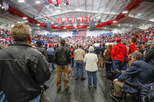 Trump supporters attend a campaign rally for Republican senatorial candidate Mike Braun in which United States President Donald Trump, Vice President Mike Pence, and former IU head basketball coach Bobby Knight were in attendance at Southport Fieldhouse on Friday, Nov. 2, 2018.