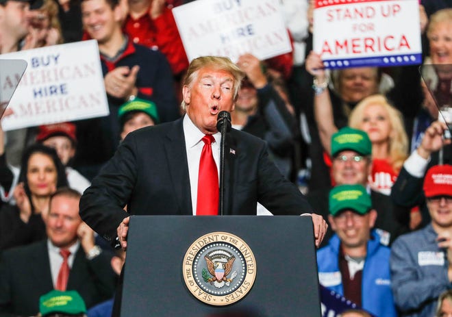 United States President Donald Trump campaigns for Republican candidate Mike Braun during a rally at Southport Fieldhouse on Friday, Nov. 2, 2018. 