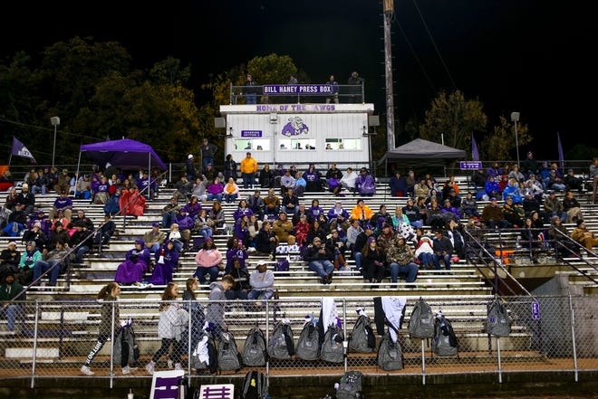 Milan fans brace the weather and crowd the stands in a TSSAA playoff game between Milan High School and Trezevant at Johnnie Hale Stadium in Milan, Tenn., on Friday, Nov. 2, 2018. 