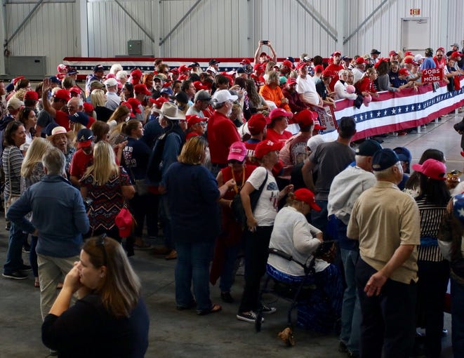 Supporters fill the ST Engineering hangar at the Pensacola International Airport on Saturday, Nov. 3, 2018, ahead of the President Donald Trump's rally.