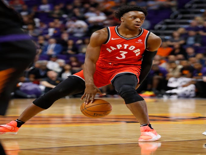 Toronto Raptors forward OG Anunoby (3) looks to pass against the Phoenix Suns during the first half of an NBA basketball game, Friday, Nov. 2, 2018, in Phoenix.