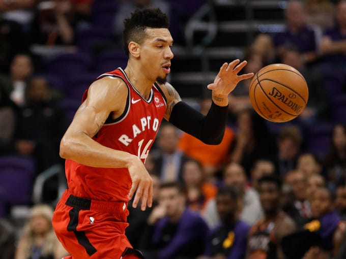 Toronto Raptors guard Danny Green (14) drives against the Phoenix Suns during the first half of an NBA basketball game, Friday, Nov. 2, 2018, in Phoenix.